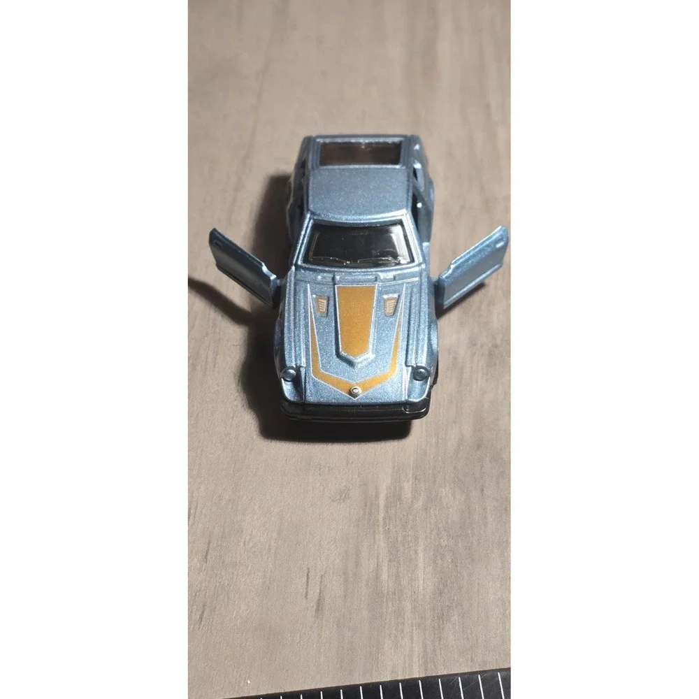 2020 Matchbox Moving Parts GTT20 '82 Datsun‎ 280 ZX Sky Blue Mtflk/Gold w/5sp NM